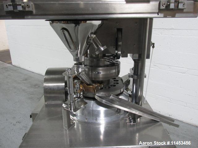 Used Used CPT (CapPlus Technologies) Econoline-M rotary tablet press, 16 stations, B tooled, keyed upper punch guide, feed hopper, 4 ton main compression pressure, rated up to 31,000 tablets/hr, seri...