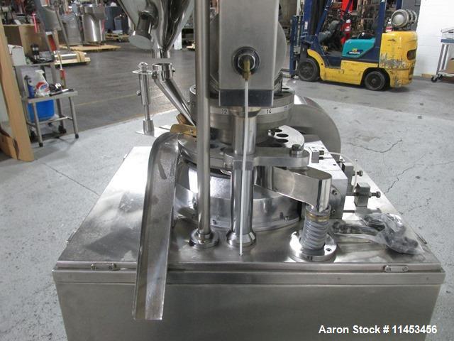 Used Used CPT (CapPlus Technologies) Econoline-M rotary tablet press, 16 stations, B tooled, keyed upper punch guide, feed hopper, 4 ton main compression pressure, rated up to 31,000 tablets/hr, seri...