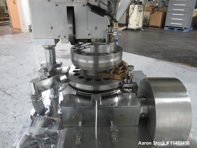 Used Used CPT (CapPlus Technologies) Econoline-M rotary tablet press, 16 stations, B tooled, keyed upper punch guide, feed hopper, 4 ton main compression pressure, rated up to 31,000 tablets/hr, seri...