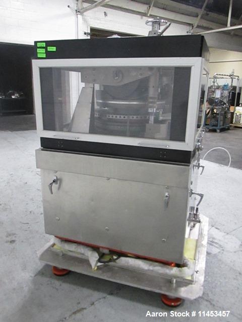 Used Used Manesty Rotapress MK IIA rotary tablet press, 61 station, double sided, with pre-compression, 6.5 tons compression, 7/16" max tablet diameter, 11/16" max depth of fill, with feed hoppers an...