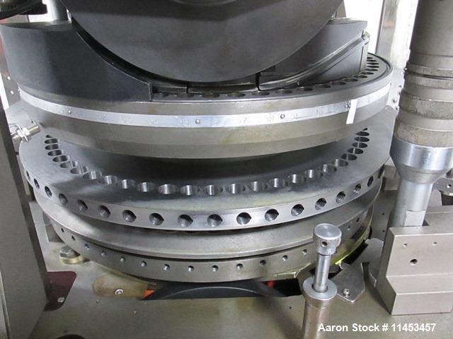 Used Used Manesty Rotapress MK IIA rotary tablet press, 61 station, double sided, with pre-compression, 6.5 tons compression, 7/16" max tablet diameter, 11/16" max depth of fill, with feed hoppers an...