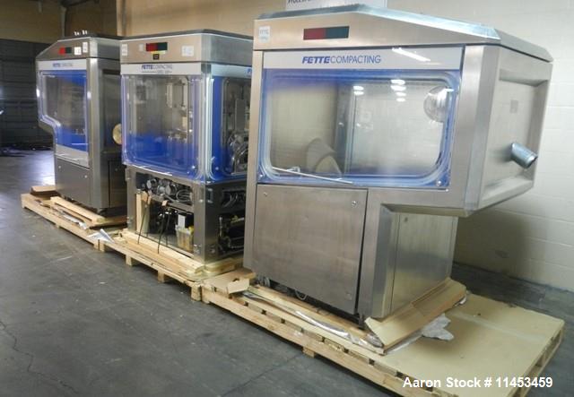 Used Used Fette 3090i WiP rotary tablet press with containment, 75 station segmented turret, 100 Kn pre-compression, 100 Kn main compression pressure, 11, 18, 25 mm max tablet diameter depending on s...
