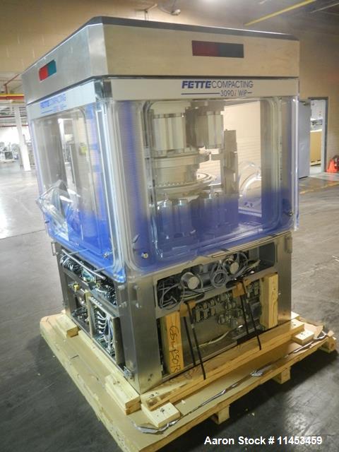 Used Used Fette 3090i WiP rotary tablet press with containment, 75 station segmented turret, 100 Kn pre-compression, 100 Kn main compression pressure, 11, 18, 25 mm max tablet diameter depending on s...