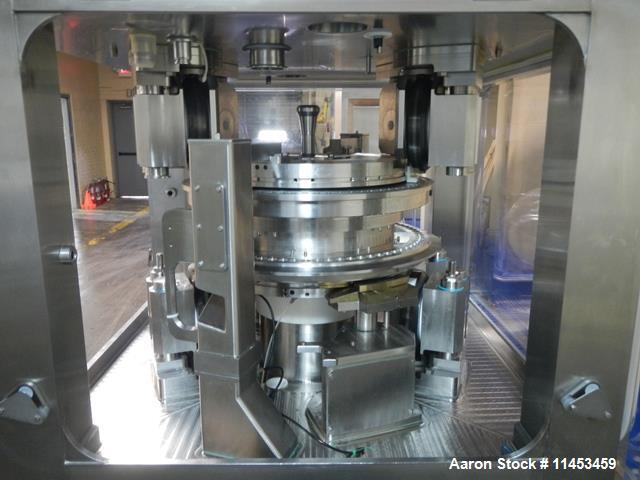 Used-Used Fette 3090i WiP rotary tablet press with containment, 75 station segmented turret, 100 Kn pre-compression, 100 Kn ...