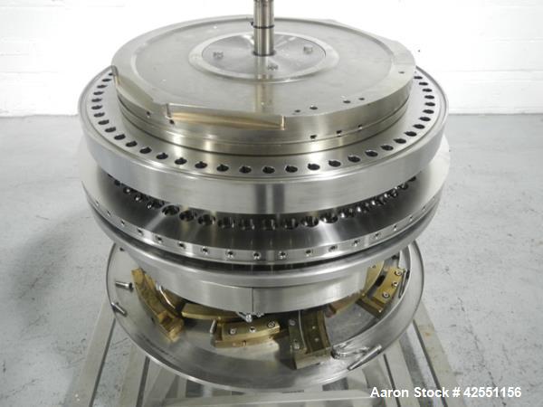 Used Fette 3090 turret, 61 station, designed for 16 mm max tablet diameter, 28 mm max depth of fill, keyed upper punch guides on cart.