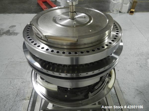 Used Fette 3090 turret, 61 station, designed for 16 mm max tablet diameter, 28 mm max depth of fill, keyed upper punch guides on cart.