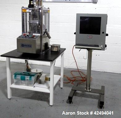 Used Riva Piccola B-C rotary tablet press, 10 station, 50 Kn compression pressure, keyed upper punch guides, 16 mm max tablet diameter, 19 mm max depth of fill, force feeder, rated up to 60,000 table...