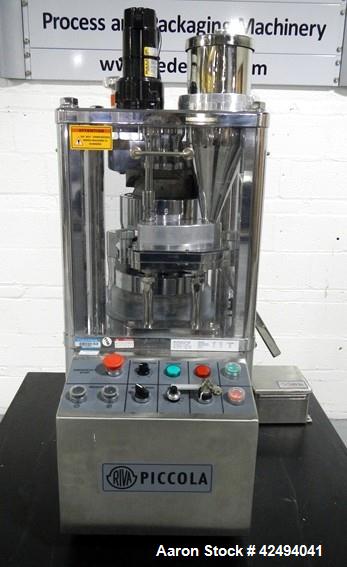 Used Riva Piccola B-C rotary tablet press, 10 station, 50 Kn compression pressure, keyed upper punch guides, 16 mm max tablet diameter, 19 mm max depth of fill, force feeder, rated up to 60,000 table...