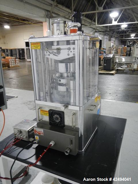 Used Riva Piccola B-C rotary tablet press, 10 station, 50 Kn compression pressure, keyed upper punch guides, 16 mm max tablet diameter, 19 mm max depth of fill, force feeder, rated up to 60,000 table...