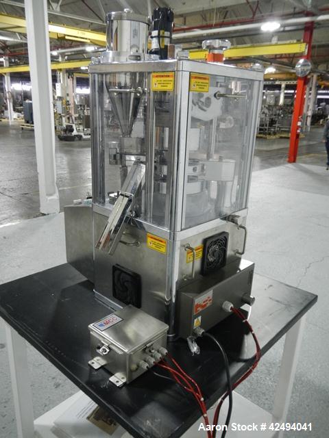 Used Riva Piccola B-C rotary tablet press, 10 station, 50 Kn compression pressure, keyed upper punch guides, 16 mm max tablet diameter, 19 mm max depth of fill, force feeder, rated up to 60,000 table...