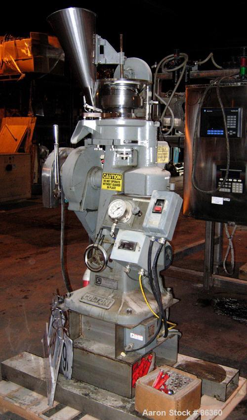 USED: Colton Rotary Tablet Press, model 216, 4 ton max pressure. 16 station max. (1) Stamping station. 3/4" max depth fill, 5/8" max diameter of tablet. 1150 max tablets per minute. Driven by a 1.5 h...