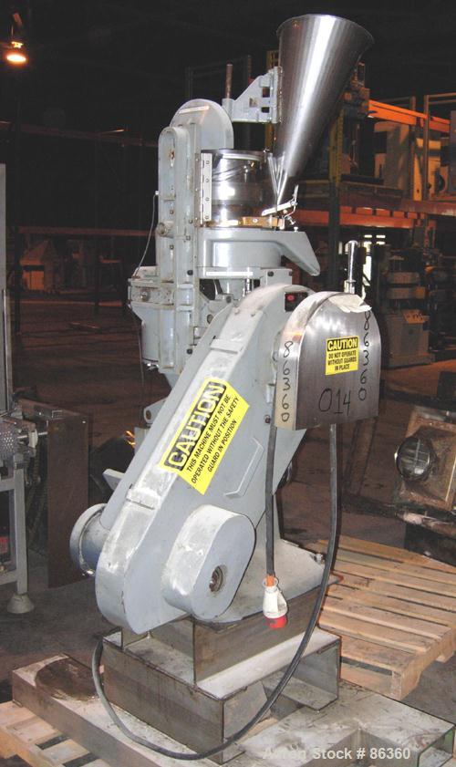 USED: Colton Rotary Tablet Press, model 216, 4 ton max pressure. 16 station max. (1) Stamping station. 3/4" max depth fill, 5/8" max diameter of tablet. 1150 max tablets per minute. Driven by a 1.5 h...