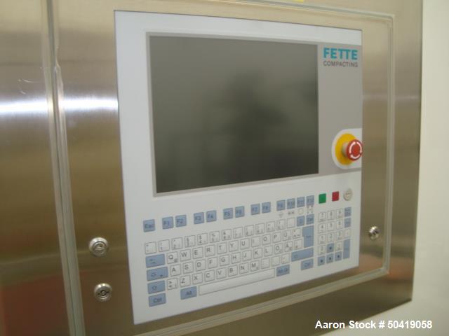 Used Fette 1200i Rotary Pharmaceutical Tablet Press With (24-Station B-Turret) With Hydraulic Lift Transport Cart, Fette Compacting Workstation Controller Panel, Mobile Stainless Steel Parts Clean Ra...