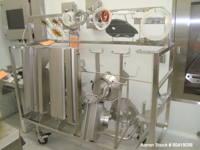 Used Fette 1200i Rotary Pharmaceutical Tablet Press With (24-Station B-Turret) With Hydraulic Lift Transport Cart, Fette Compacting Workstation Controller Panel, Mobile Stainless Steel Parts Clean Ra...