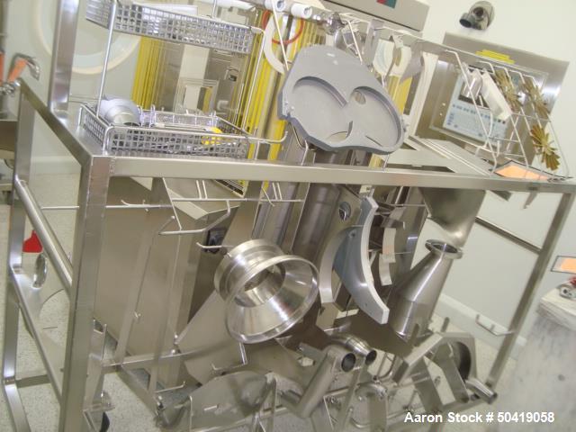 Used Fette 1200i Rotary Pharmaceutical Tablet Press With (24-Station B-Turret) With Hydraulic Lift Transport Cart, Fette Compacting Workstation Controller Panel, Mobile Stainless Steel Parts Clean Ra...