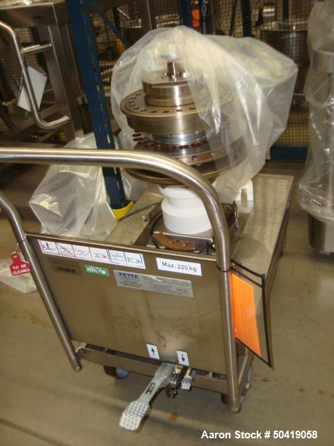 Used-Fette 1200i Rotary Pharmaceutical Tablet Press With (24-Station B-Turret) With Hydraulic Lift Transport Cart, Fette Com...