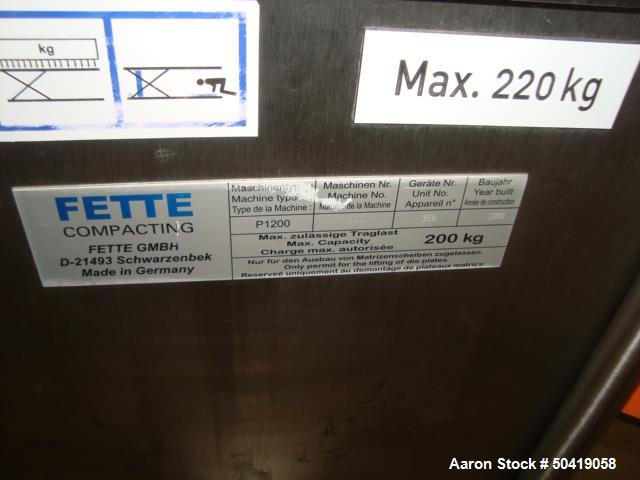 Used Fette 1200i Rotary Pharmaceutical Tablet Press With (24-Station B-Turret) With Hydraulic Lift Transport Cart, Fette Compacting Workstation Controller Panel, Mobile Stainless Steel Parts Clean Ra...