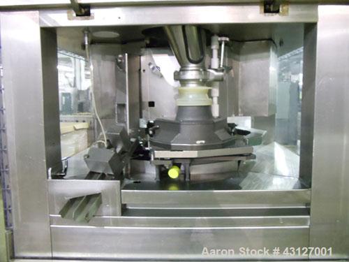 Used Fette Rotary Tablet Press, Model 3090. 61 Station, keyed upper punch guides, 100 KN main compression, 100 KN pre compression, dual sided, 16 mm max tablet diameter, 18 mm max depth of fill, rate...