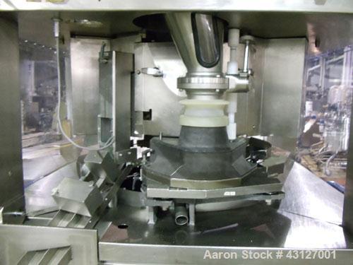 Used Fette Rotary Tablet Press, Model 3090. 61 Station, keyed upper punch guides, 100 KN main compression, 100 KN pre compression, dual sided, 16 mm max tablet diameter, 18 mm max depth of fill, rate...