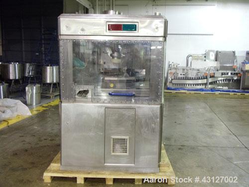 Used Fette Rotary Tablet Press, Model 3090. 61 Station, keyed upper punch guides, 100 KN main compression, 100 KN pre compression, dual sided, 16 mm max tablet diameter, 18 mm max depth of fill, rate...