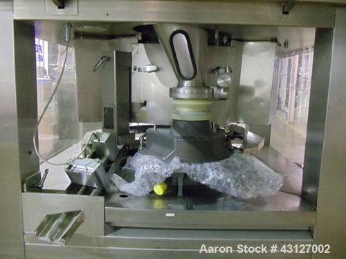 Used Fette Rotary Tablet Press, Model 3090. 61 Station, keyed upper punch guides, 100 KN main compression, 100 KN pre compression, dual sided, 16 mm max tablet diameter, 18 mm max depth of fill, rate...