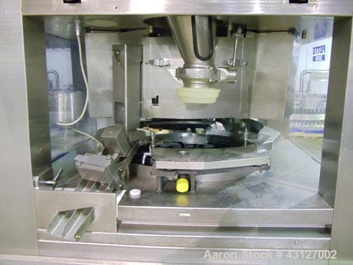 Used Fette Rotary Tablet Press, Model 3090. 61 Station, keyed upper punch guides, 100 KN main compression, 100 KN pre compression, dual sided, 16 mm max tablet diameter, 18 mm max depth of fill, rate...