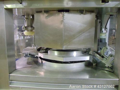 Used Fette Rotary Tablet Press, Model 3090. 61 Station, keyed upper punch guides, 100 KN main compression, 100 KN pre compression, dual sided, 16 mm max tablet diameter, 18 mm max depth of fill, rate...