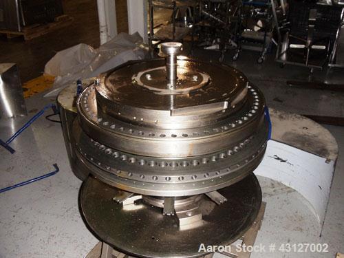 Used Fette Rotary Tablet Press, Model 3090. 61 Station, keyed upper punch guides, 100 KN main compression, 100 KN pre compression, dual sided, 16 mm max tablet diameter, 18 mm max depth of fill, rate...