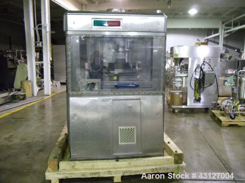 Used Fette Rotary Tablet Rress, Model 3090. 61 Station, keyed upper punch guides, 100 KN main compression, 100 KN pre compression, dual sided, 16 mm max tablet diameter, 18 mm max depth of fill, rate...
