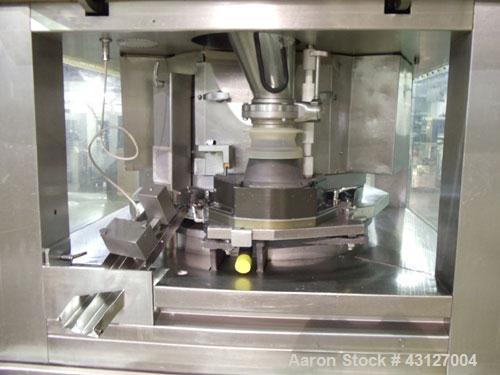 Used Fette Rotary Tablet Rress, Model 3090. 61 Station, keyed upper punch guides, 100 KN main compression, 100 KN pre compression, dual sided, 16 mm max tablet diameter, 18 mm max depth of fill, rate...