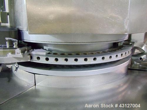 Used Fette Rotary Tablet Rress, Model 3090. 61 Station, keyed upper punch guides, 100 KN main compression, 100 KN pre compression, dual sided, 16 mm max tablet diameter, 18 mm max depth of fill, rate...