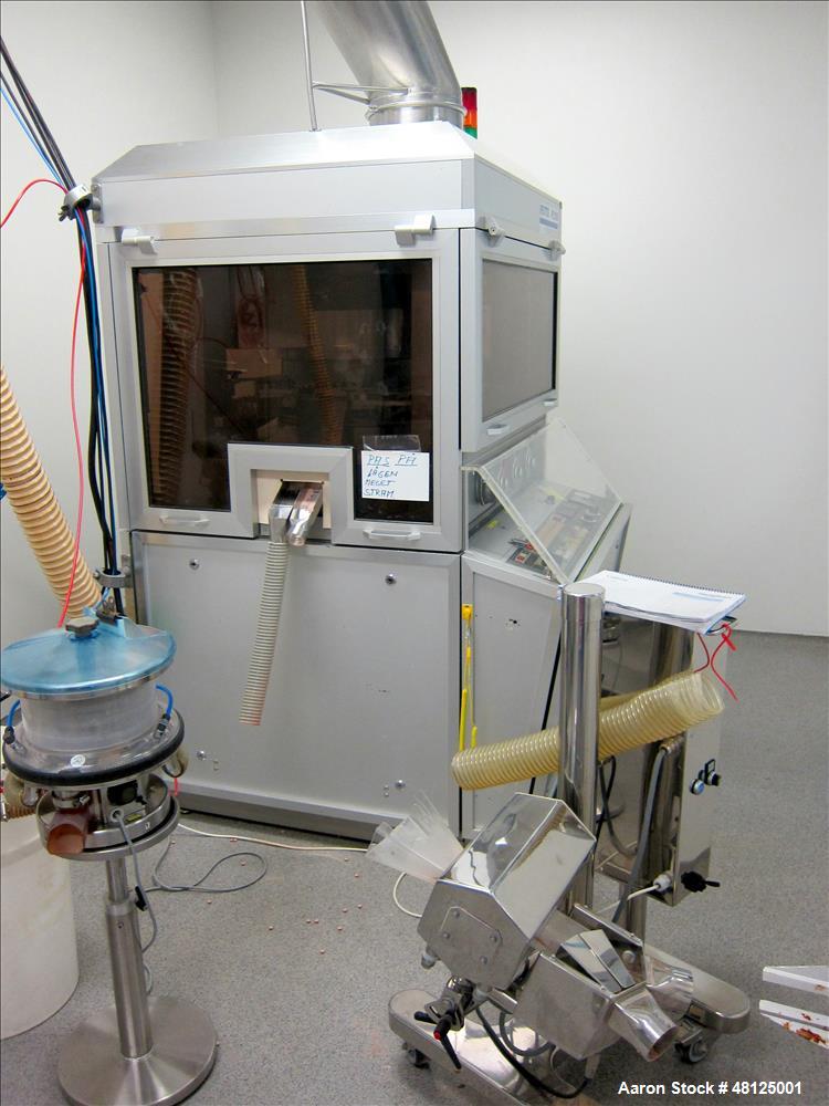 Used Fette Rotor Tablet Press, Type P2100. 43 Stations, B tooling, Overall dimensions: 3’9” (1200 mm) L x 4’4” (1350 mm) W x 6’8” (2100 mm) H. Incl. (1) Kramer deduster, type E09, (1) Safeline, metal...