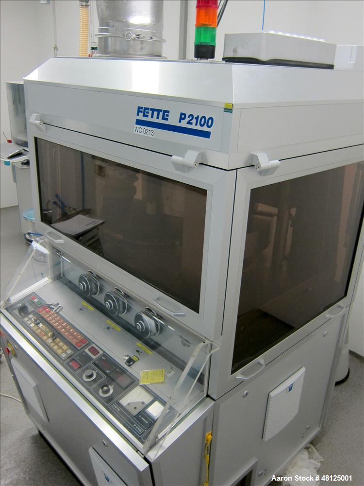 Used Fette Rotor Tablet Press, Type P2100. 43 Stations, B tooling, Overall dimensions: 3’9” (1200 mm) L x 4’4” (1350 mm) W x 6’8” (2100 mm) H. Incl. (1) Kramer deduster, type E09, (1) Safeline, metal...