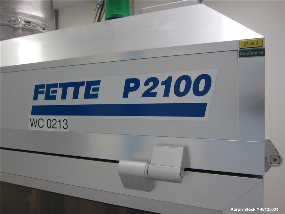 Used Fette Rotor Tablet Press, Type P2100. 43 Stations, B tooling, Overall dimensions: 3’9” (1200 mm) L x 4’4” (1350 mm) W x 6’8” (2100 mm) H. Incl. (1) Kramer deduster, type E09, (1) Safeline, metal...