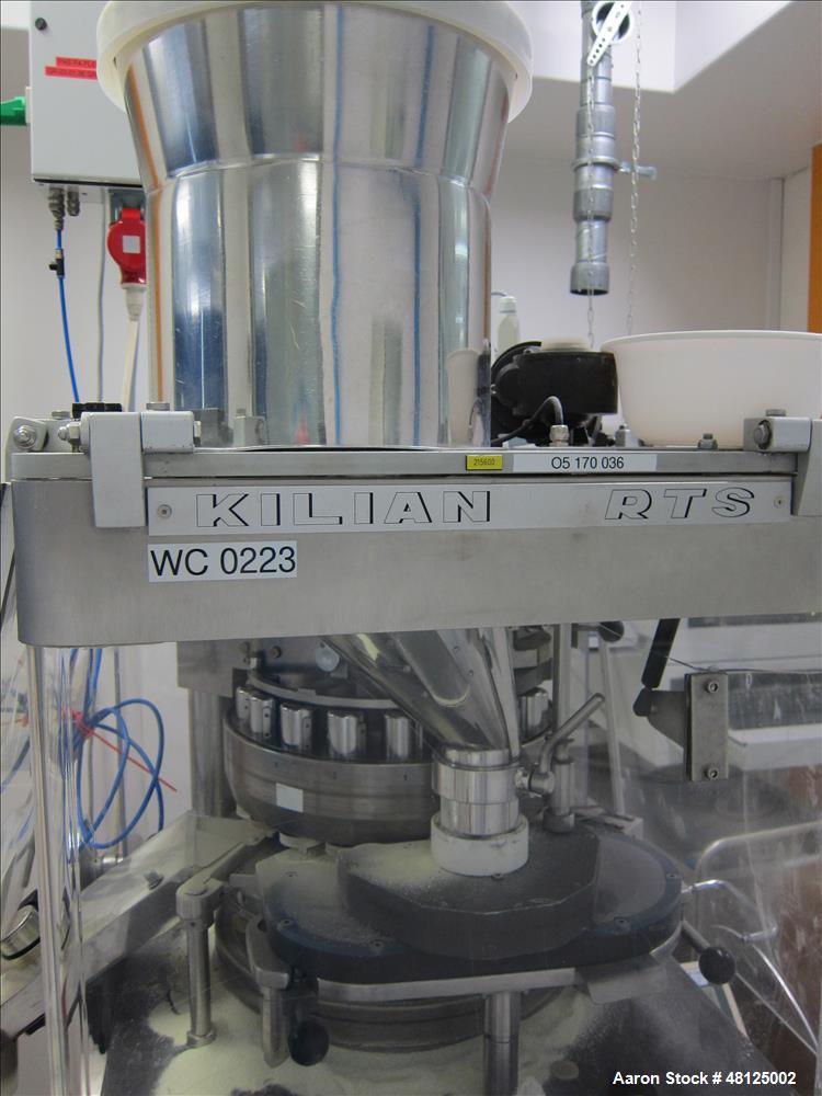 Used Kilian Rotor Tablet Press, Type RTS 18. 18 Stations, D-tooling, 100 Kn compression rating, 28 mm max tablet dia., 38 mm max depth of tablet fill, working capacity rated up to 75,600 tablets/hour...