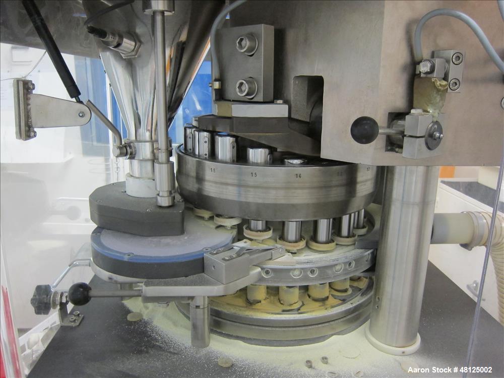 Used Kilian Rotor Tablet Press, Type RTS 18. 18 Stations, D-tooling, 100 Kn compression rating, 28 mm max tablet dia., 38 mm max depth of tablet fill, working capacity rated up to 75,600 tablets/hour...