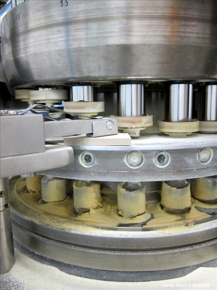 Used Kilian Rotor Tablet Press, Type RTS 18. 18 Stations, D-tooling, 100 Kn compression rating, 28 mm max tablet dia., 38 mm max depth of tablet fill, working capacity rated up to 75,600 tablets/hour...