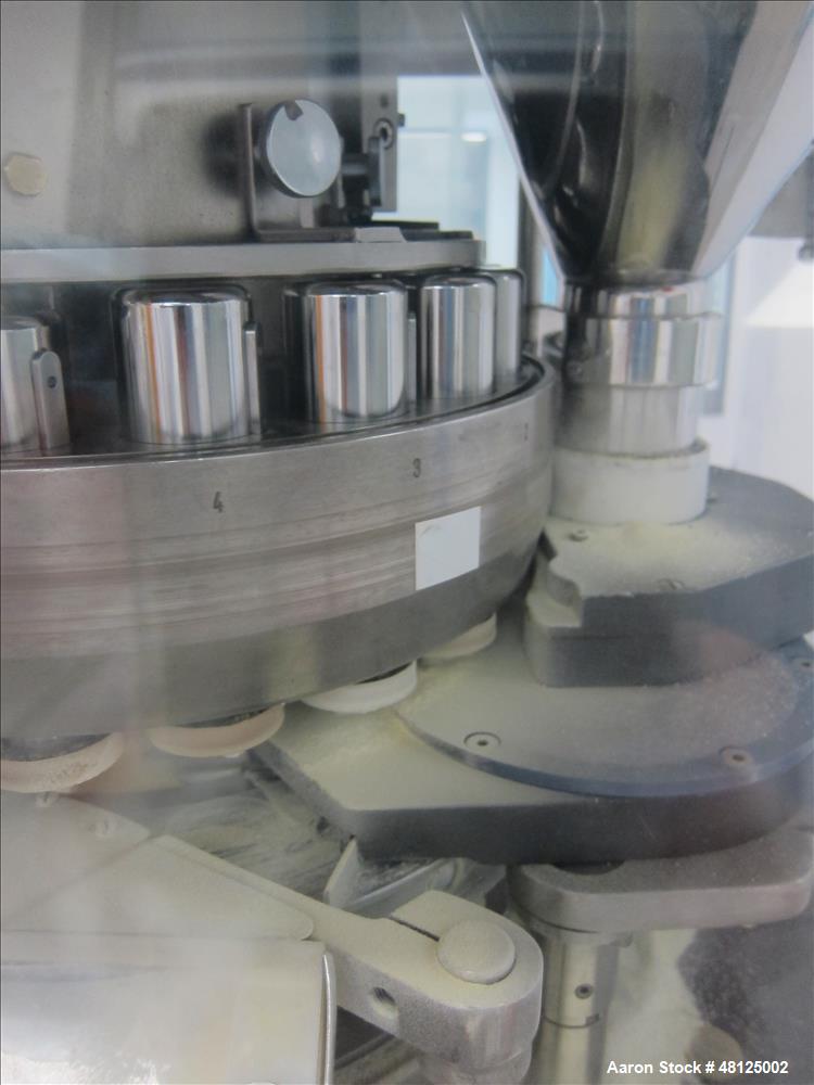Used Kilian Rotor Tablet Press, Type RTS 18. 18 Stations, D-tooling, 100 Kn compression rating, 28 mm max tablet dia., 38 mm max depth of tablet fill, working capacity rated up to 75,600 tablets/hour...