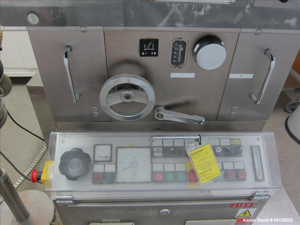 Used Kilian Rotor Tablet Press, Type RTS 18. 18 Stations, D-tooling, 100 Kn compression rating, 28 mm max tablet dia., 38 mm max depth of tablet fill, working capacity rated up to 75,600 tablets/hour...