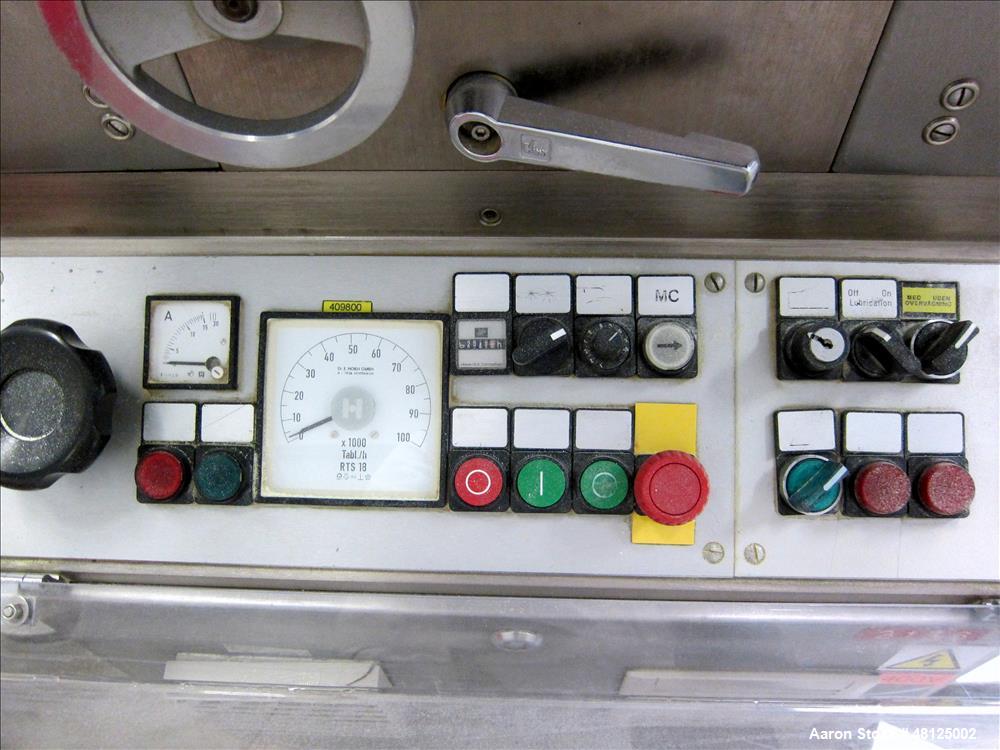 Used Kilian Rotor Tablet Press, Type RTS 18. 18 Stations, D-tooling, 100 Kn compression rating, 28 mm max tablet dia., 38 mm max depth of tablet fill, working capacity rated up to 75,600 tablets/hour...