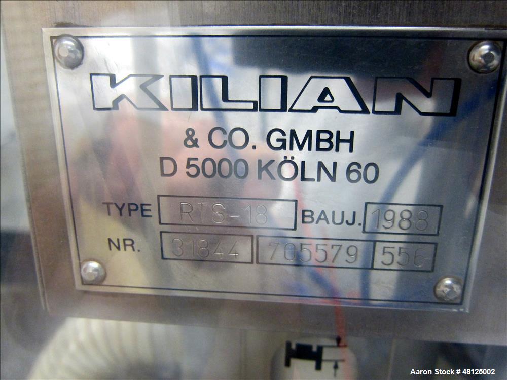 Used Kilian Rotor Tablet Press, Type RTS 18. 18 Stations, D-tooling, 100 Kn compression rating, 28 mm max tablet dia., 38 mm max depth of tablet fill, working capacity rated up to 75,600 tablets/hour...