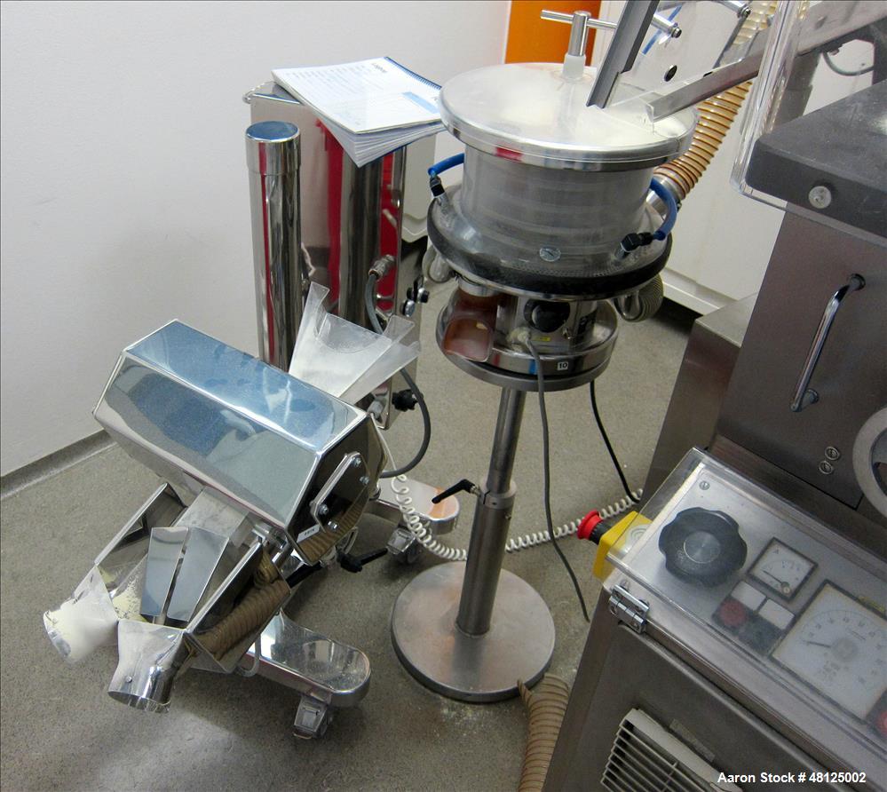 Used Kilian Rotor Tablet Press, Type RTS 18. 18 Stations, D-tooling, 100 Kn compression rating, 28 mm max tablet dia., 38 mm max depth of tablet fill, working capacity rated up to 75,600 tablets/hour...