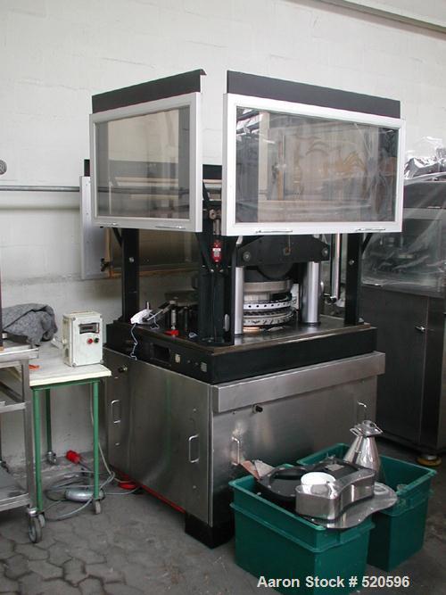 USED: Killion RX51 rotary tablet press. 51 stations, double sided, fitted pre-compression, upper keyed. Max output 500,000 tablets per hour. Power supply 380 volt/50 cycle/3 ph. Control operating pan...