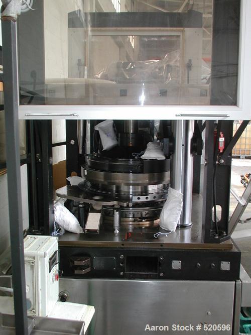 USED: Killion RX51 rotary tablet press. 51 stations, double sided, fitted pre-compression, upper keyed. Max output 500,000 tablets per hour. Power supply 380 volt/50 cycle/3 ph. Control operating pan...
