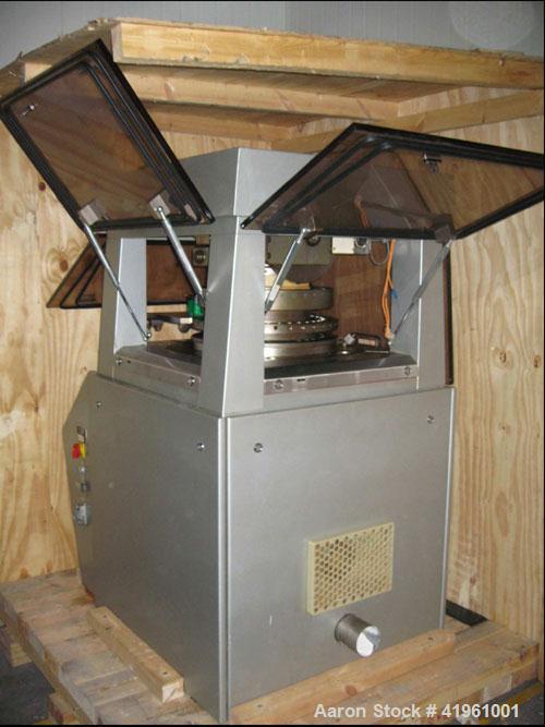 Used Korsch PH 300 Tablet Press. 36 station, max compression force 9 tons (80 kN), max tablet diameter 0.63" (16 mm), max filling depth 0.71" (18 mm), max tablet height 0.34" (8.5 mm), capacity 17280...