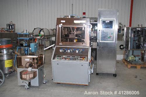 Used Korsch PH300 Rotary Tablet Press. 43 station, rotor with hard chrome plating, stainless steel hopper, force feed system, pre-compression station, compression station, tablet chute, separate cont...