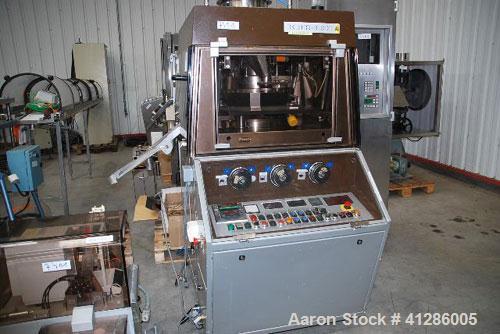 Used Korsch PH300 Rotary Tablet Press. 43 station, rotor with hard chrome plating, stainless steel hopper, force feed system, pre-compression station, compression station, tablet chute, separate cont...