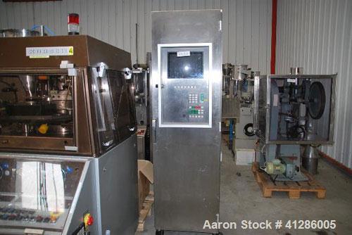 Used Korsch PH300 Rotary Tablet Press. 43 station, rotor with hard chrome plating, stainless steel hopper, force feed system, pre-compression station, compression station, tablet chute, separate cont...