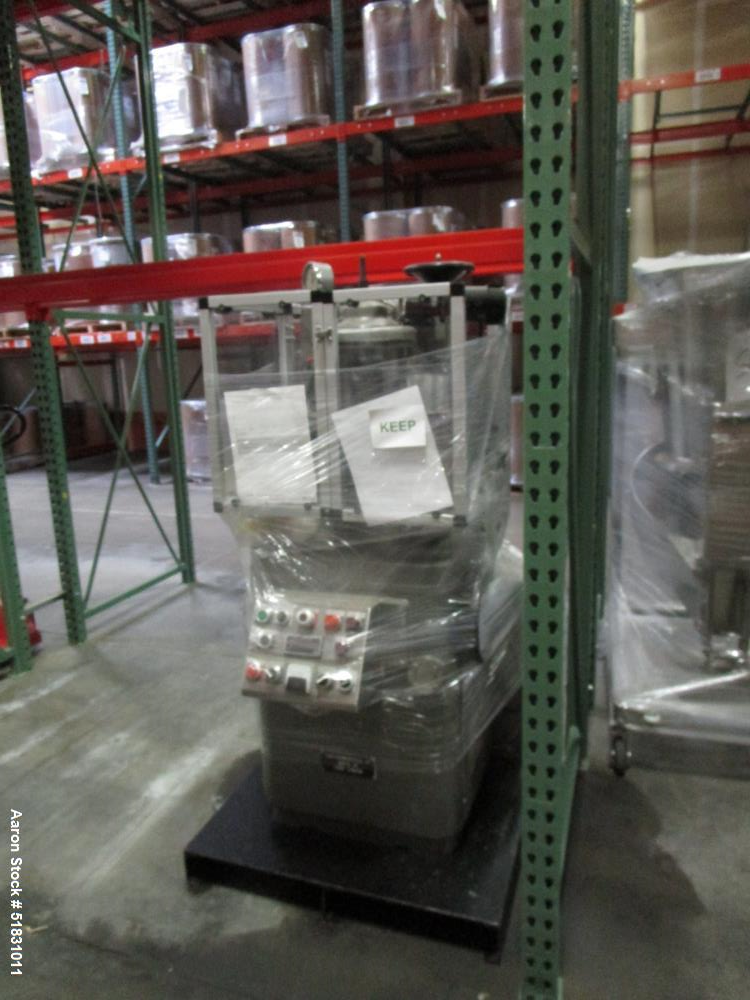 Used Manesty Express Press with precompression. Keyed uppers, b tooling 25 station.