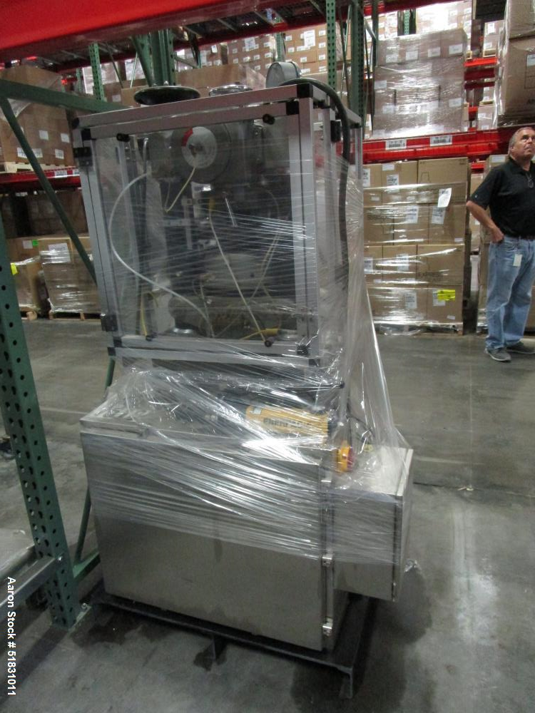 Used Manesty Express Press with precompression. Keyed uppers, b tooling 25 station.